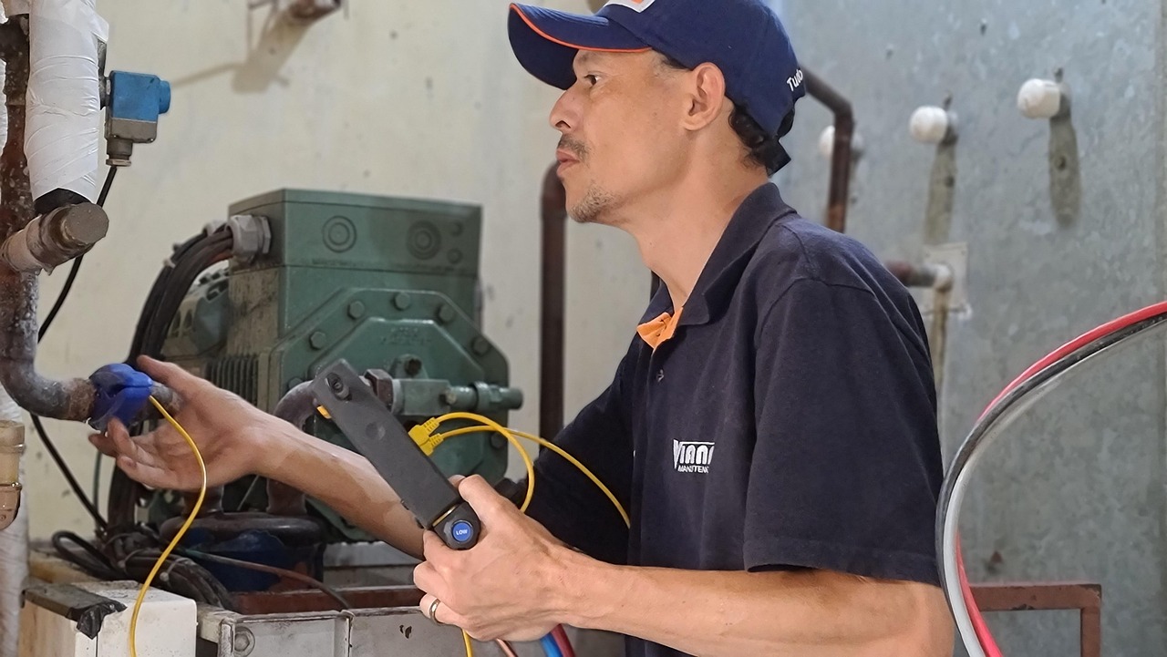 HVAC technician installing ductless mini split